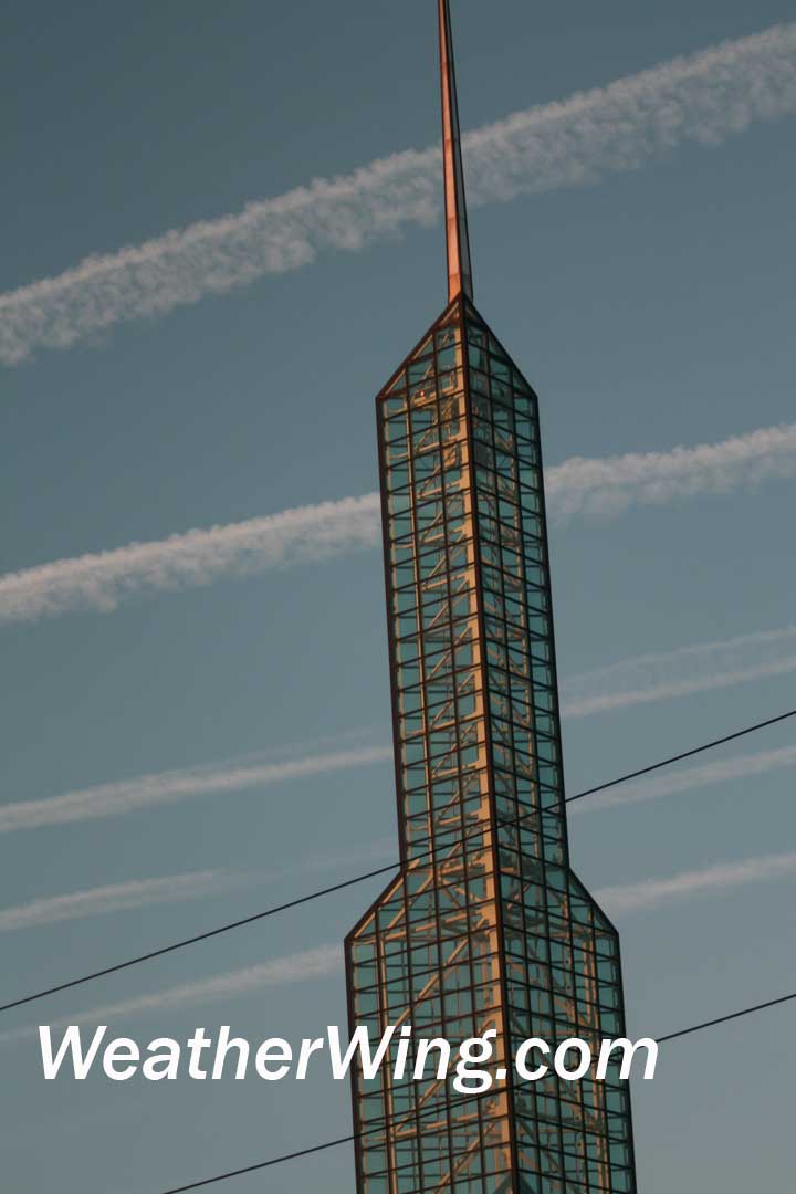 CONTRAILS BEHIND BUILDING PORTLAND